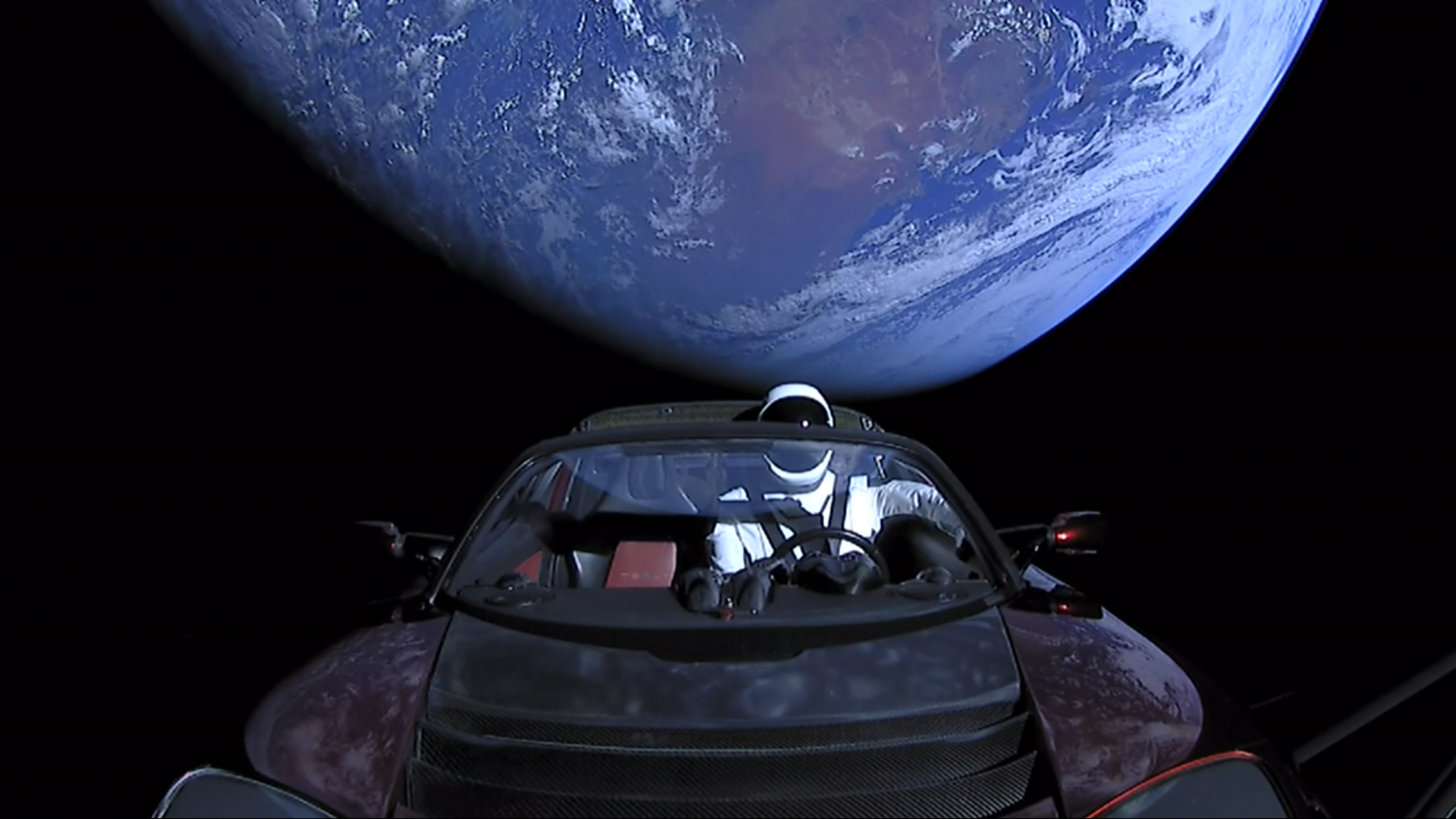 Elon_Musk's_Tesla_Roadster_(40110297852).jpg